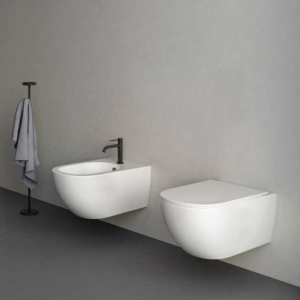 Wc e Bidet sospesi in ceramica bianca opaca Pin Nic Design